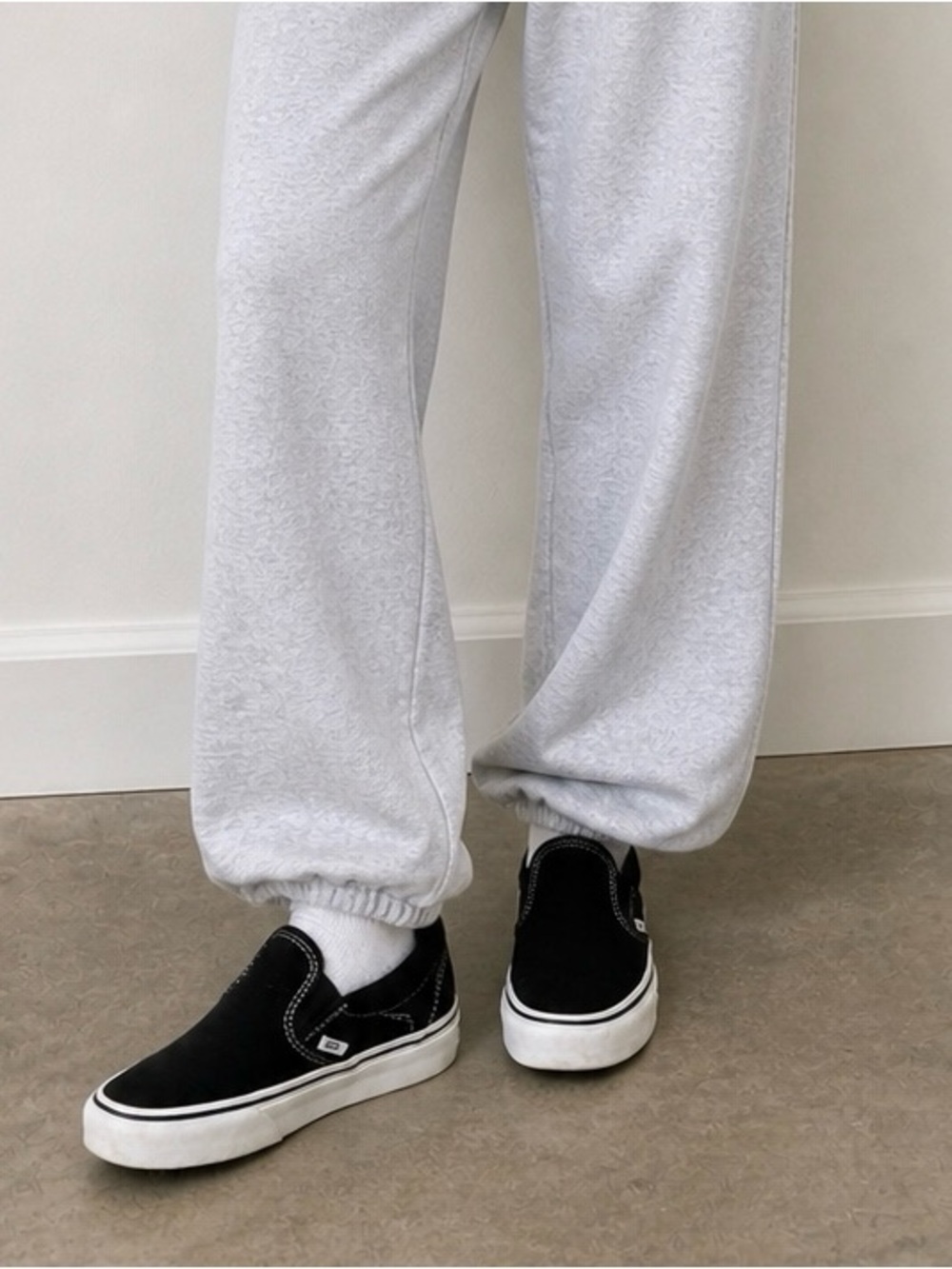 Vans Classic Slip-On Sneakers in Black and White